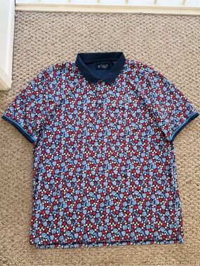 Penguin Men's Blue & Red Floral Polo Shirt - Classic Collared Style